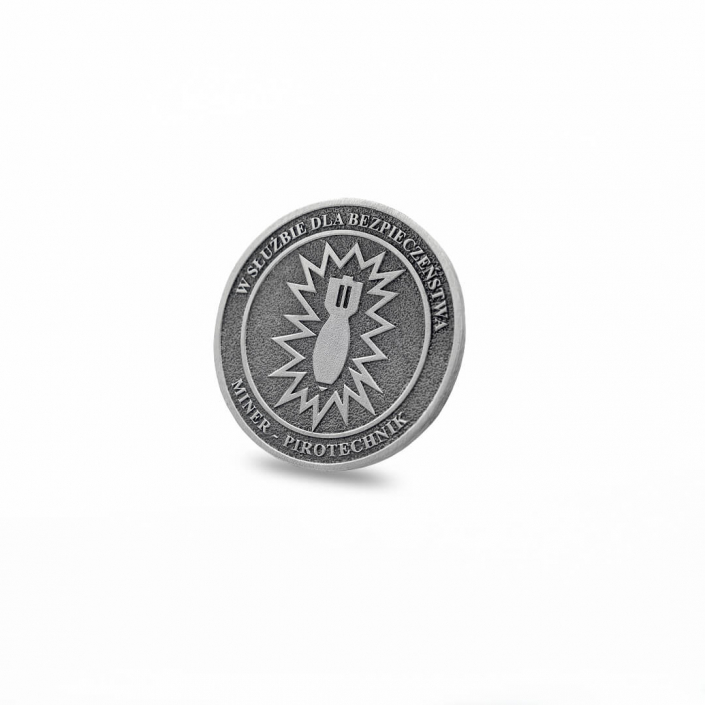 Silver colored special challenge coin for a sapper military unit