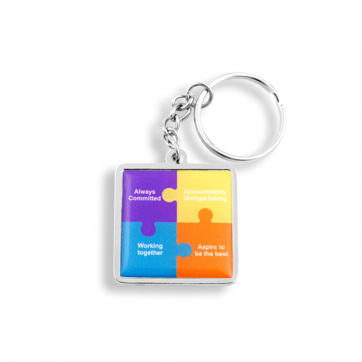 Colorful puzzle promotional keyring with an inset