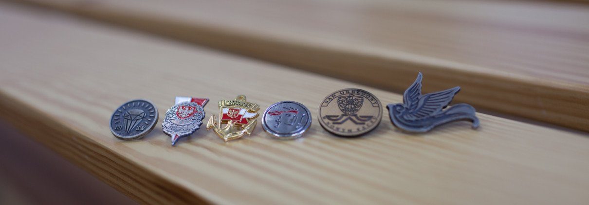 Composition of custom metal pin badges produced by Metal Casts