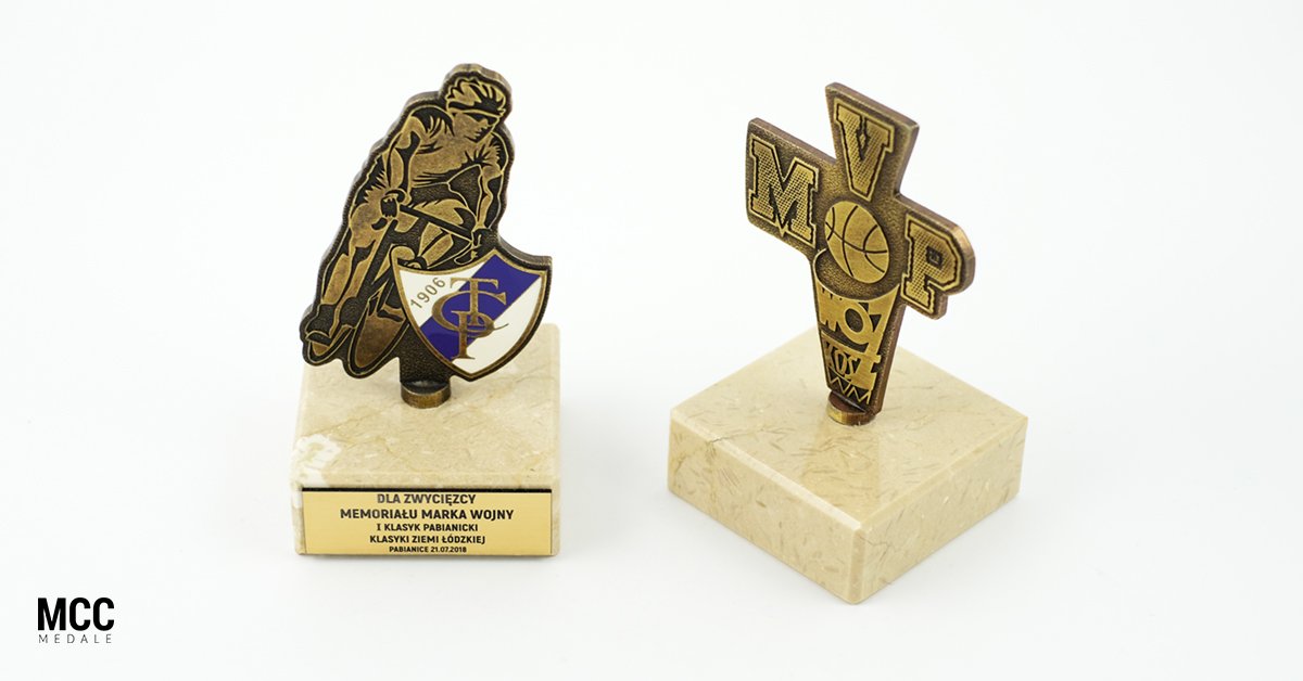 Two custom statuettes trophies