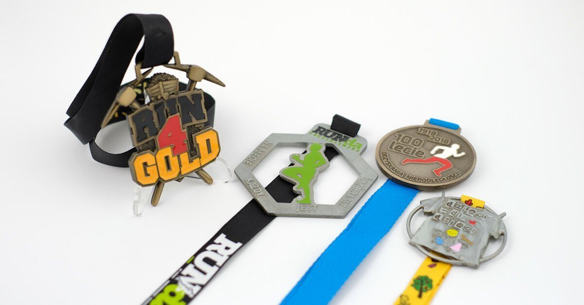 Set of custom running medals with ribbons