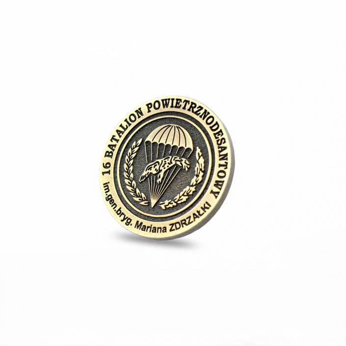 Golden colored challenge coin produced for air assault military unit