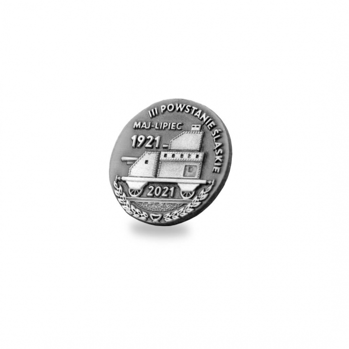 Silver colored historical challenge coin